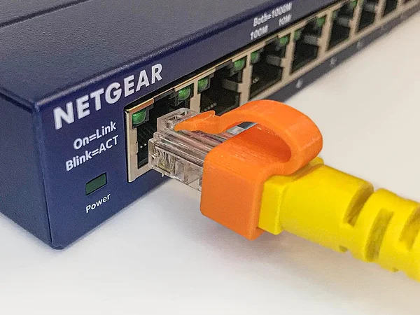 RJ45 Ethernet Clip for a Broken Latch Tab
